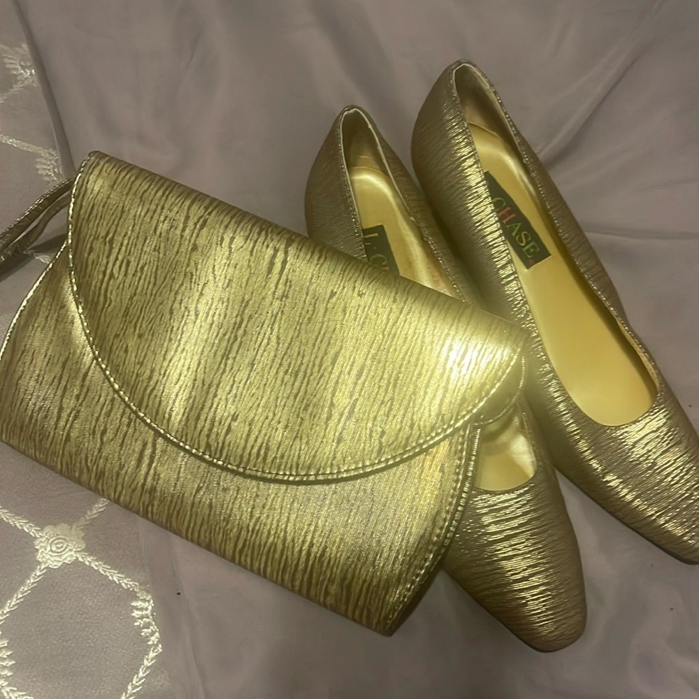 Gold and brown tiger print shoes with matching clutch.